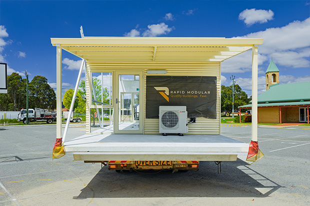 Rapid Modular WA modular building loaded on a truck for delivery to site